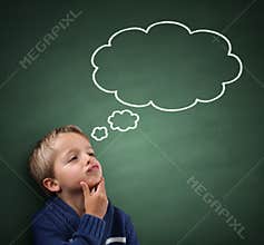 Thinking with thought bubble on blackboard