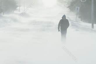Walking in Snow Storm