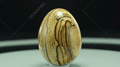 Revolving picture jasper carving egg
