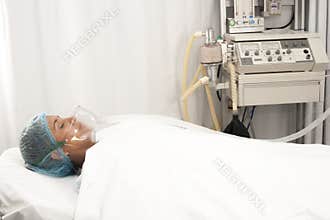 Beautiful patient receives anaesthetic