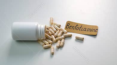 Benfotiamine capsules and vitamin supplements. Selective focus.