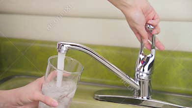 Glass of iced tap water