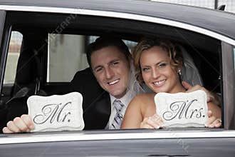 Wedding couple in Limousine