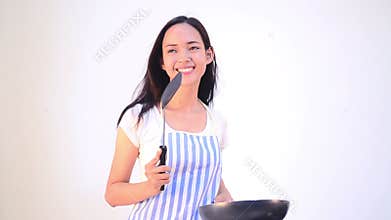Asian woman cooking isolated