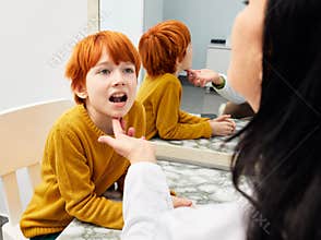 A child with a speech therapist. Paediatric speech and language therapy