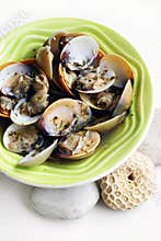 dish cooked with wine, garlic, herbs