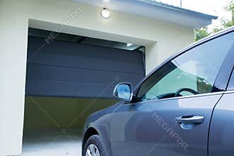 Car near the automatic garage door