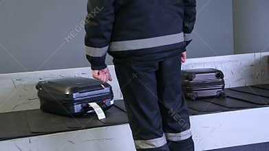 Border dog on a conveyor belt at the airport.