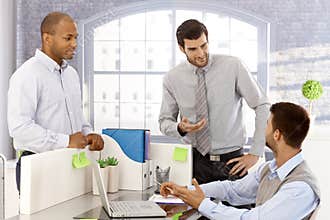 Young businessmen working together