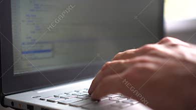 Website or software development - programmer working on laptop