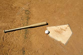 Baseball and Bat on Home Plate