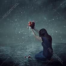Broken heart during rain storm