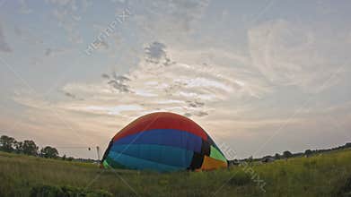 Hot air balloon - Time-lapse of burner firing and inflates the envelope