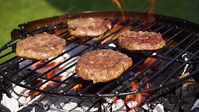 Burgers on barbecue grill