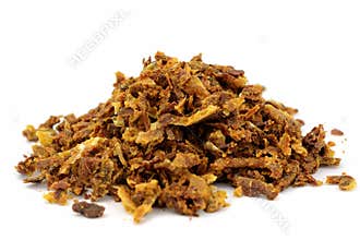 Propolis granules isolated on white background. Bee products. Apitherapy. Apiculture.