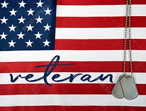 Veteran dog tags on American flag