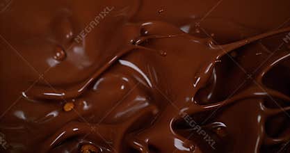 Hazelnuts Falling in Milk Chocolate,