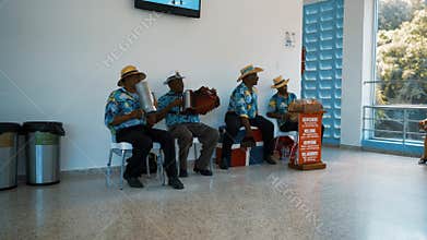 Local musical band playing on the traditional national instruments.