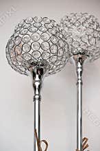 Two unique silver chrome lamps