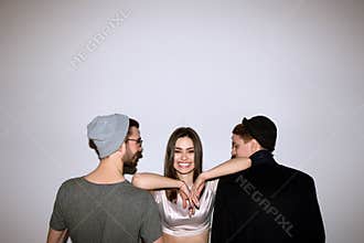 Happy girl in relationship with two men