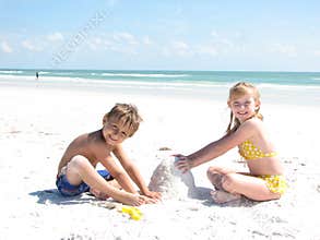 Children building sandcastles