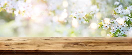 Spring background with wooden table
