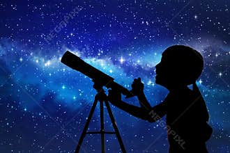 Silhouette of little girl looking through a telescope