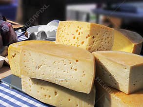 Farmer markets offering Swiss and French cheeses.