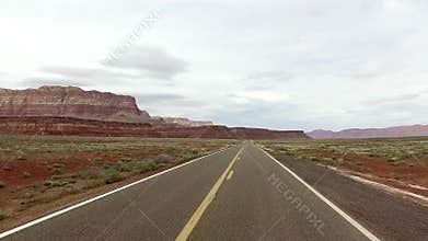 Incredibly beautiful spring landscape in Utah. Road driving POV. Geological formation weather water erosion. Nature