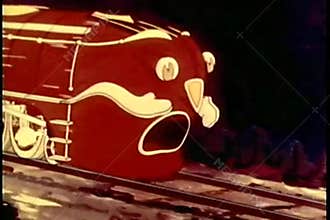 Red train blowing whistle