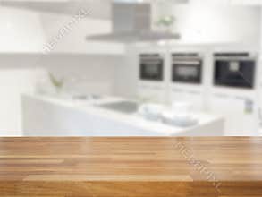 Empty table and blurred kitchen background