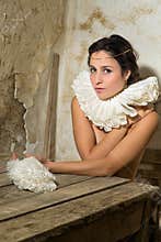 Nude with lace collar