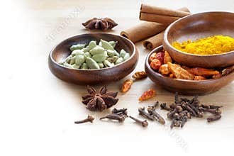 Exotic spices, corner background for indian cooking blurred to w