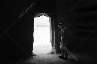 Saudian inside a Nabatean tomb in Madaîn Saleh archeological si