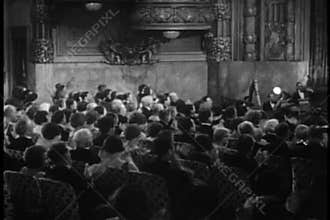 Audience clapping during theatrical performance