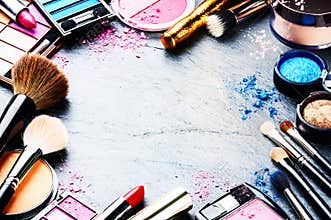 Colorful frame with various makeup products