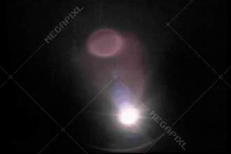 Person with flashlight searching in the dark