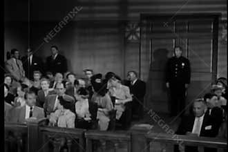 WIde shot of courtroom chatter