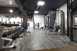 Modern gym interior with various equipment