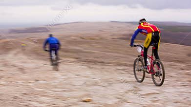 EDITORIAL. Young Professional Cyclists Racing Fast