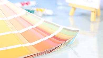 Choice from palette color scale, hand pointing