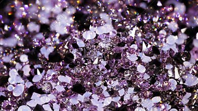 Many small brilliant jewel stones rotating