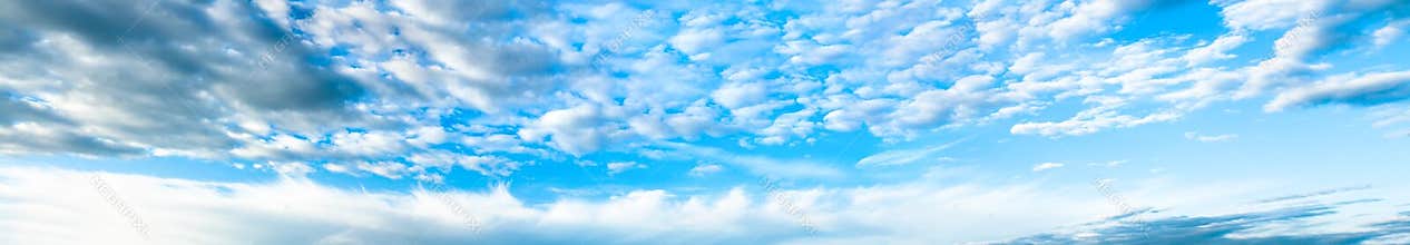 Panorama with the blue sky and white clouds