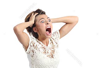 Scared crazy woman crying with hands on head