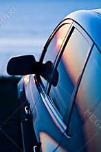 Sunse reflected in car