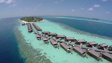 Luxurious over-water villas on tropical island resort
