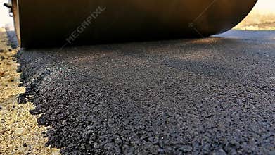 Vibration roller compactor at asphalt pavement works