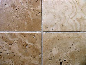 Four travertine tiles