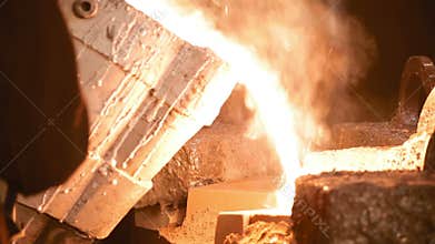 The liquid metal is poured into mold