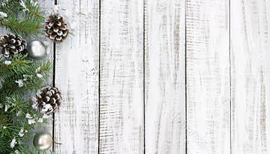 Composition with decorated Christmas tree on white rustic wooden